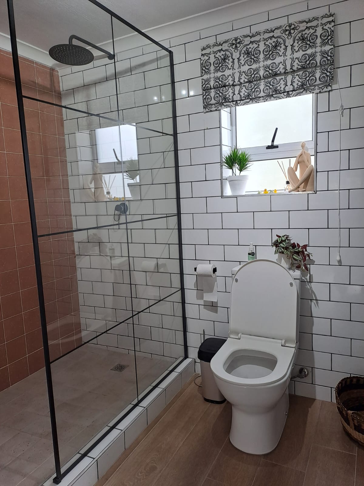 Subway tile bathroom with rain shower